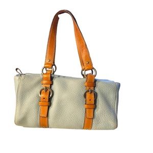 Light blue pebble leather Chelsea Coach Satchel with tan straps.